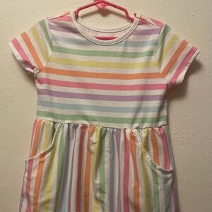 Girls' Rainbow Stripe Short-Sleeve Dress with pockets.